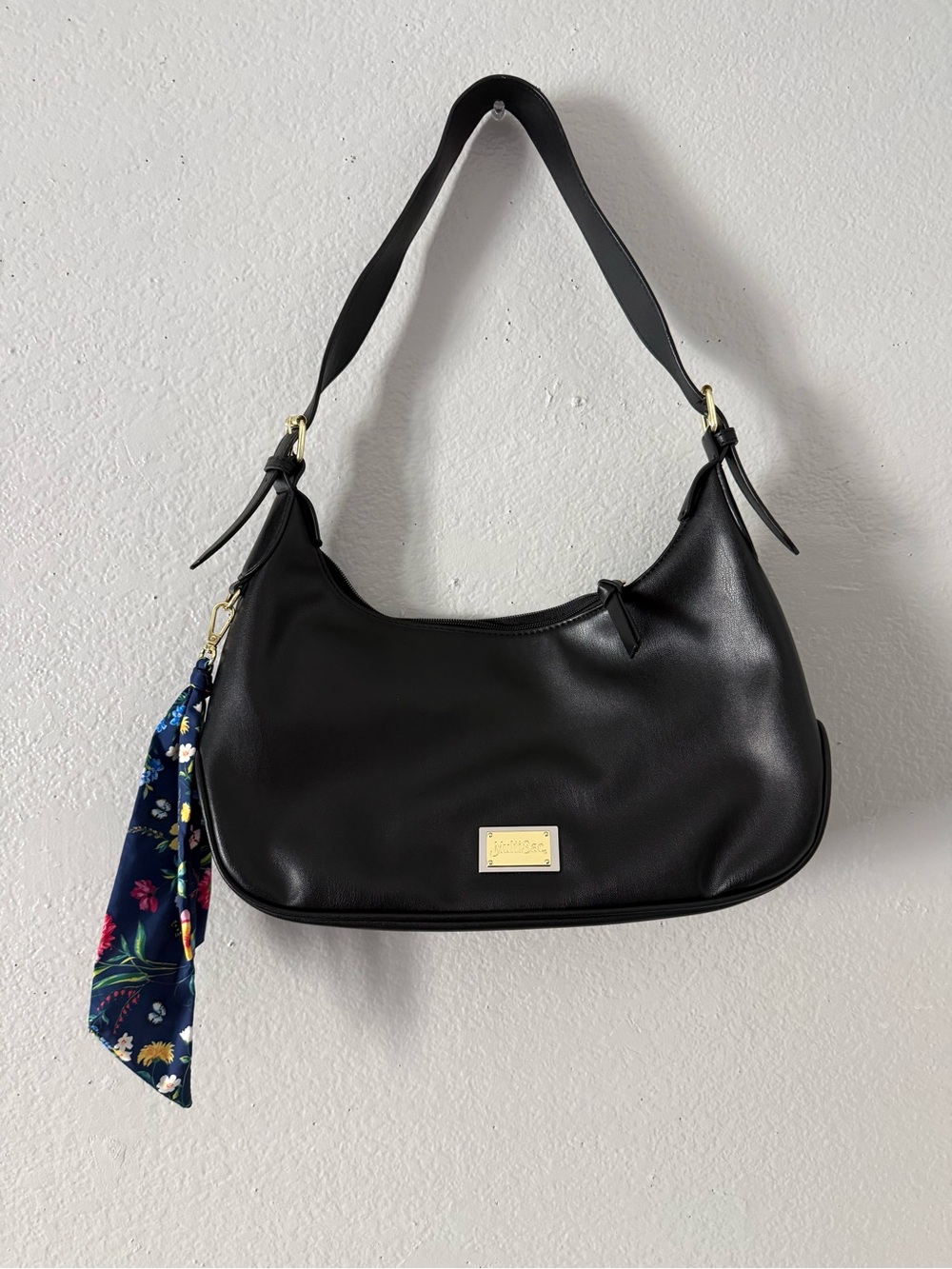 Classic Black Shoulder Bag with Floral Scarf Accent